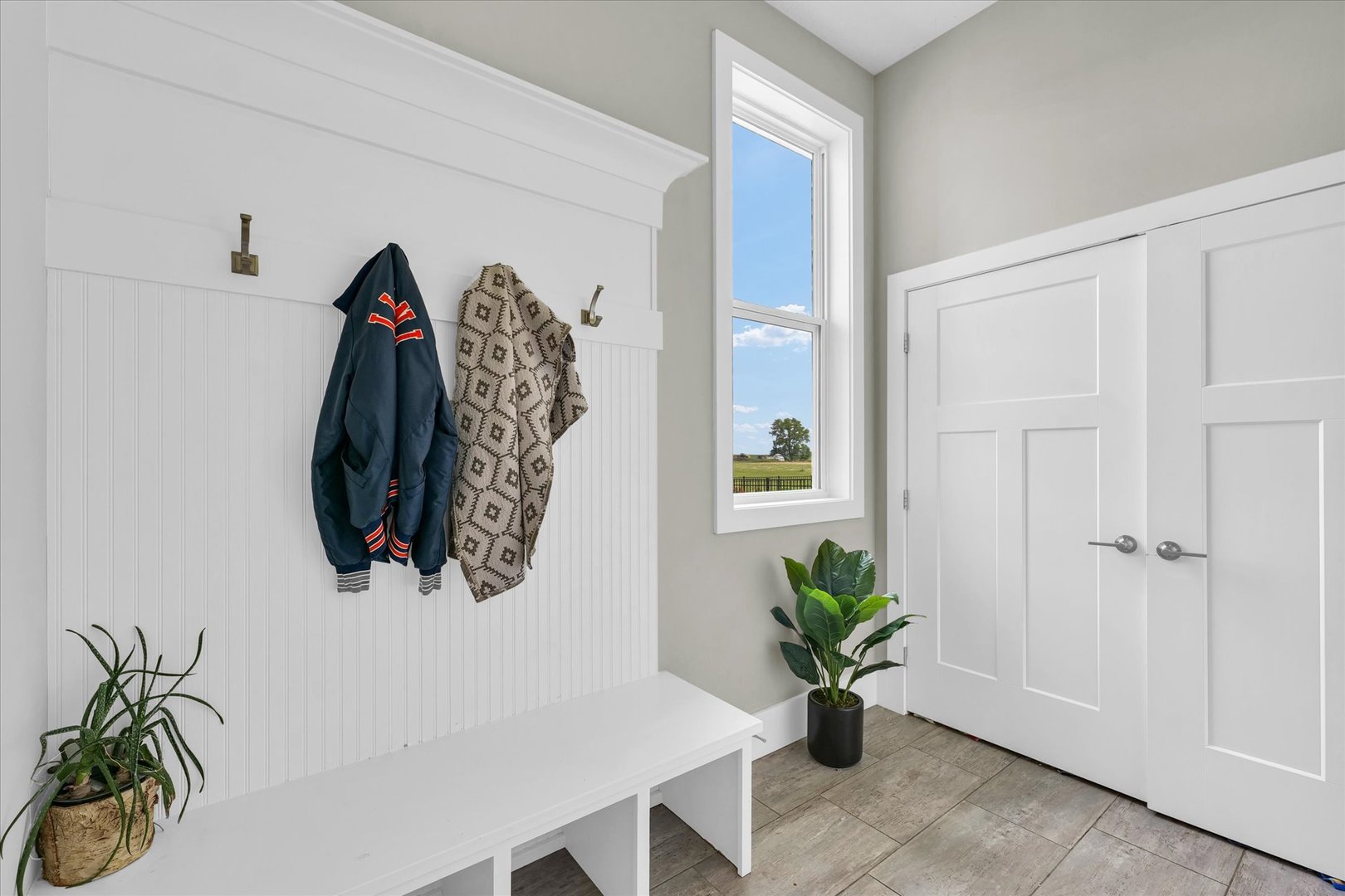 1908 Littlefield Lane Mahomet, IL 61853 - Photo 19 of 51 a view of a hallway with paintings on the wall