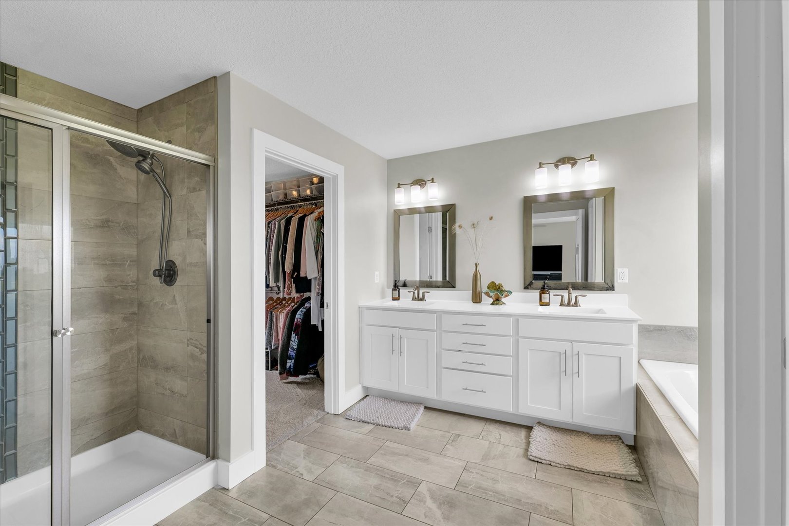 1908 Littlefield Lane Mahomet, IL 61853 - Photo 29 of 51 a bathroom with a double vanity sink mirror and shower