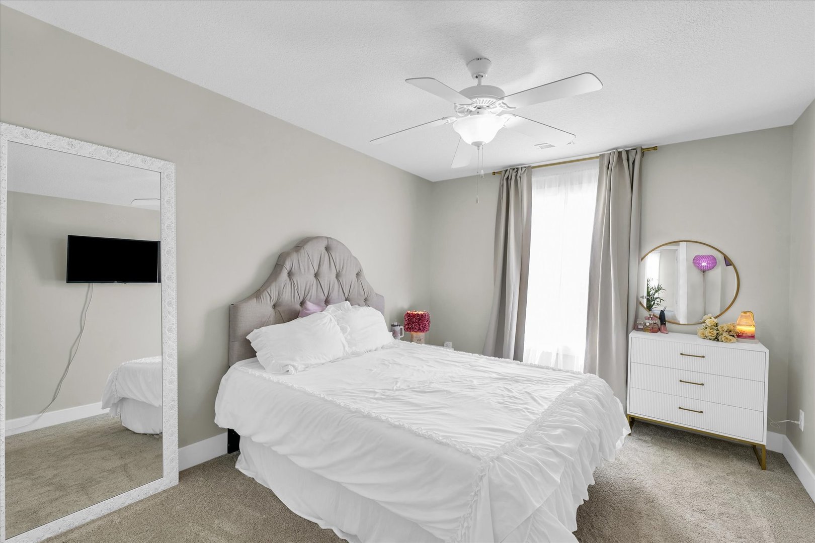 1908 Littlefield Lane Mahomet, IL 61853 - Photo 37 of 51 a bedroom with a bed and a chandelier