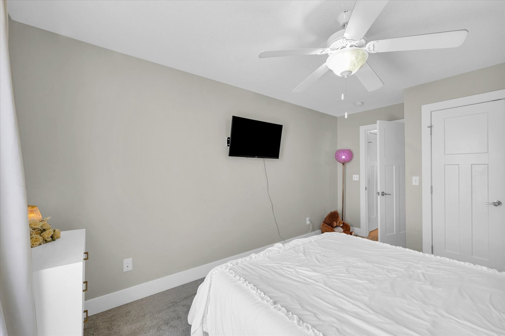 1908 Littlefield Lane Mahomet, IL 61853 - Photo 38 of 51 a bedroom with a bed and a flat screen tv