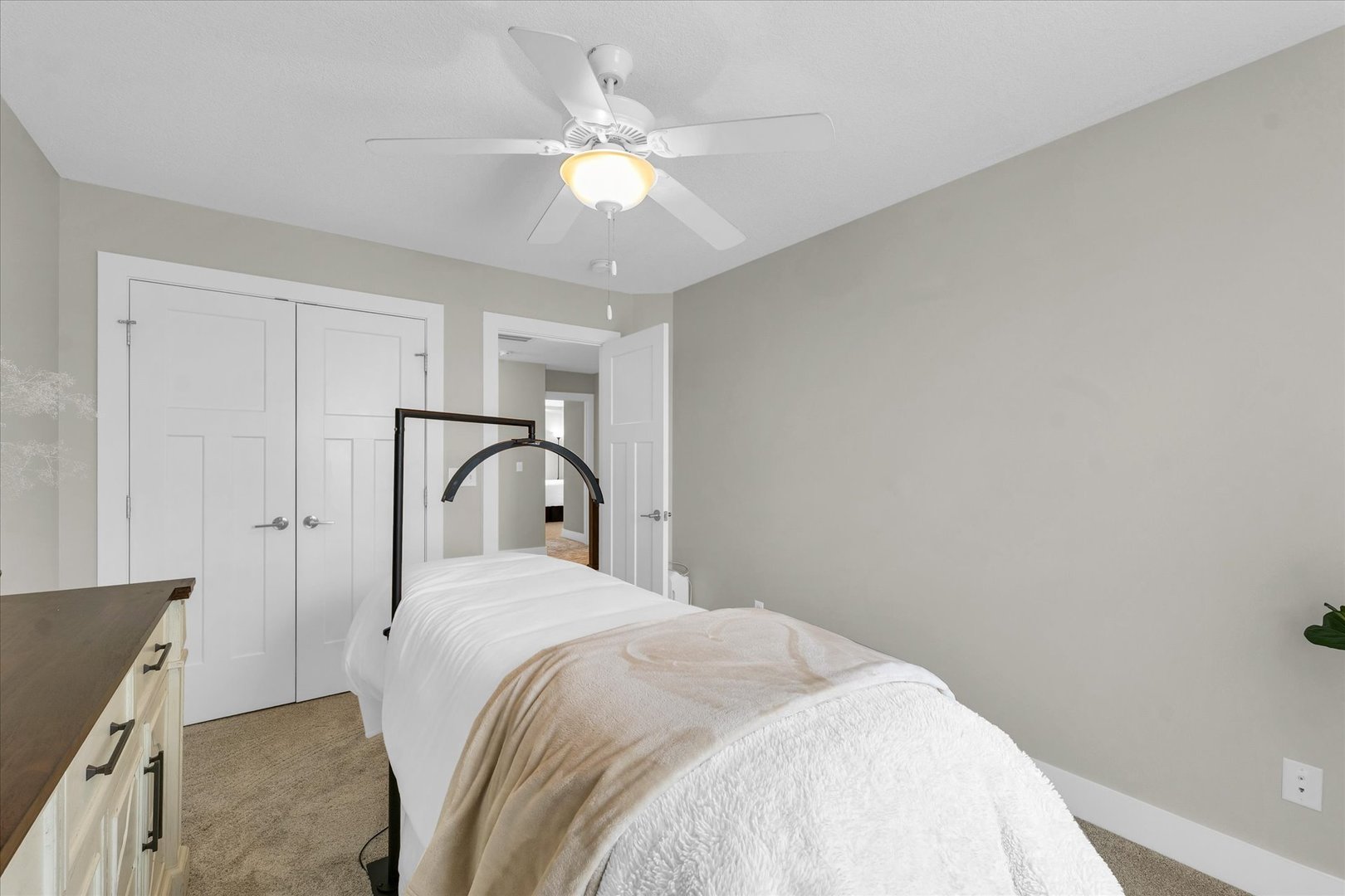 1908 Littlefield Lane Mahomet, IL 61853 - Photo 41 of 51 a bedroom with a bed and a ceiling fan