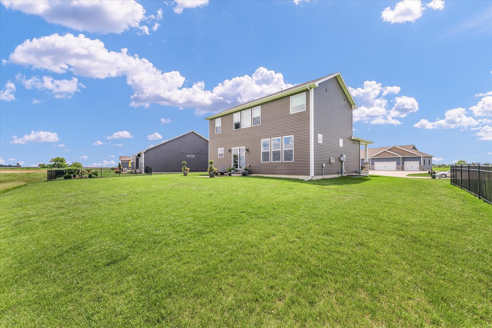 1908 Littlefield Lane Mahomet, IL 61853 - Photo 47 of 51 a view of a house with a big yard and large trees