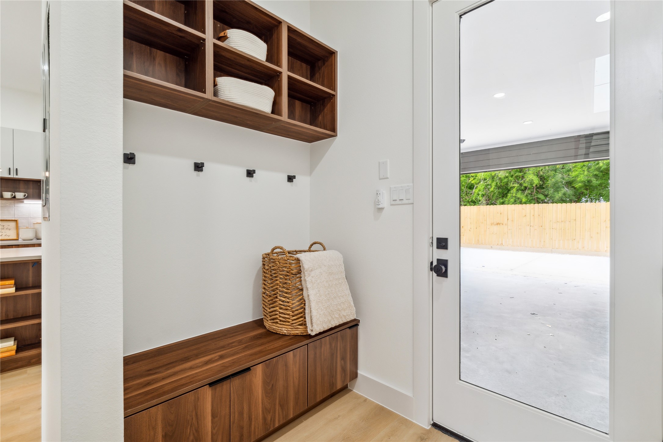 3415 Stonewall Street Houston, TX 77020 - Photo 25 of 50 This stylish mudroom nook offers everyday convenience with built-in seating, storage, and wall hooks—perfect for keeping life organized in a beautifully designed space.