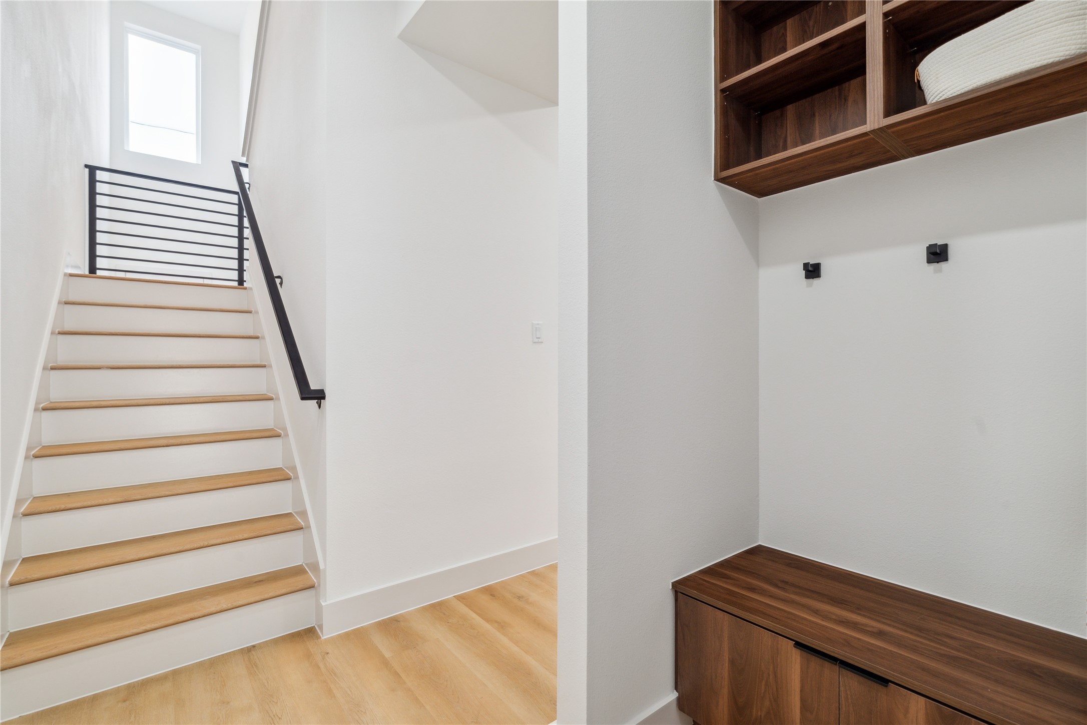 3415 Stonewall Street Houston, TX 77020 - Photo 26 of 50 Follow the clean architectural lines upstairs to discover your private retreat—where thoughtful design meets everyday serenity.