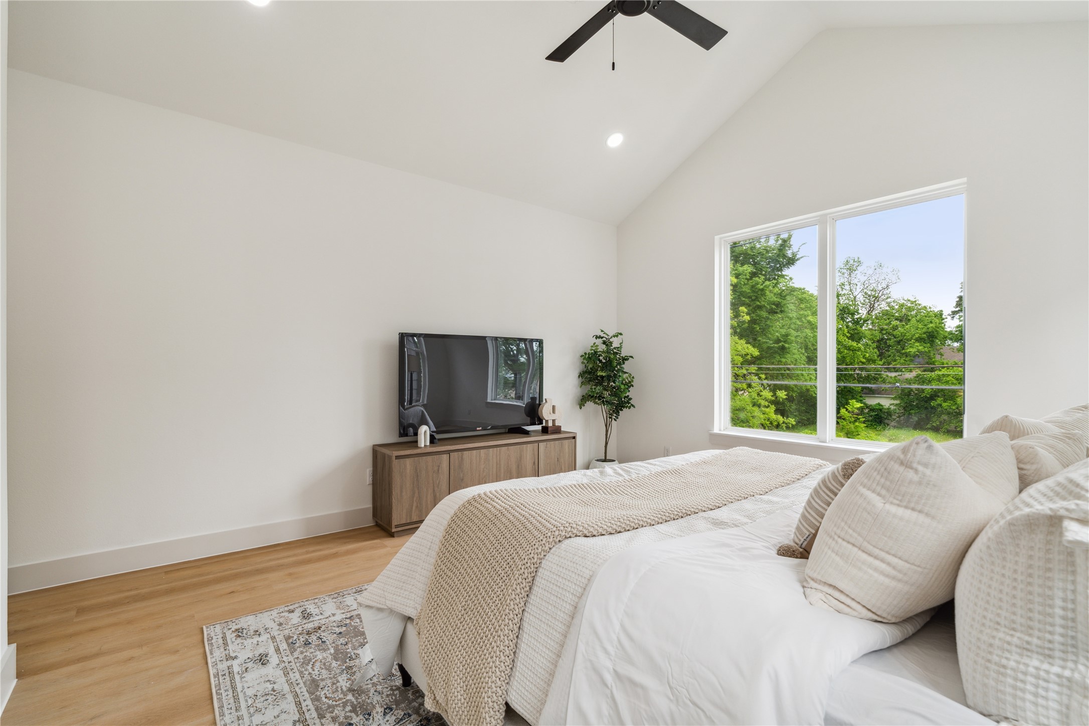 3415 Stonewall Street Houston, TX 77020 - Photo 31 of 50 With generous space and serene views, this primary retreat invites you to unwind, recharge, and truly make it your own.