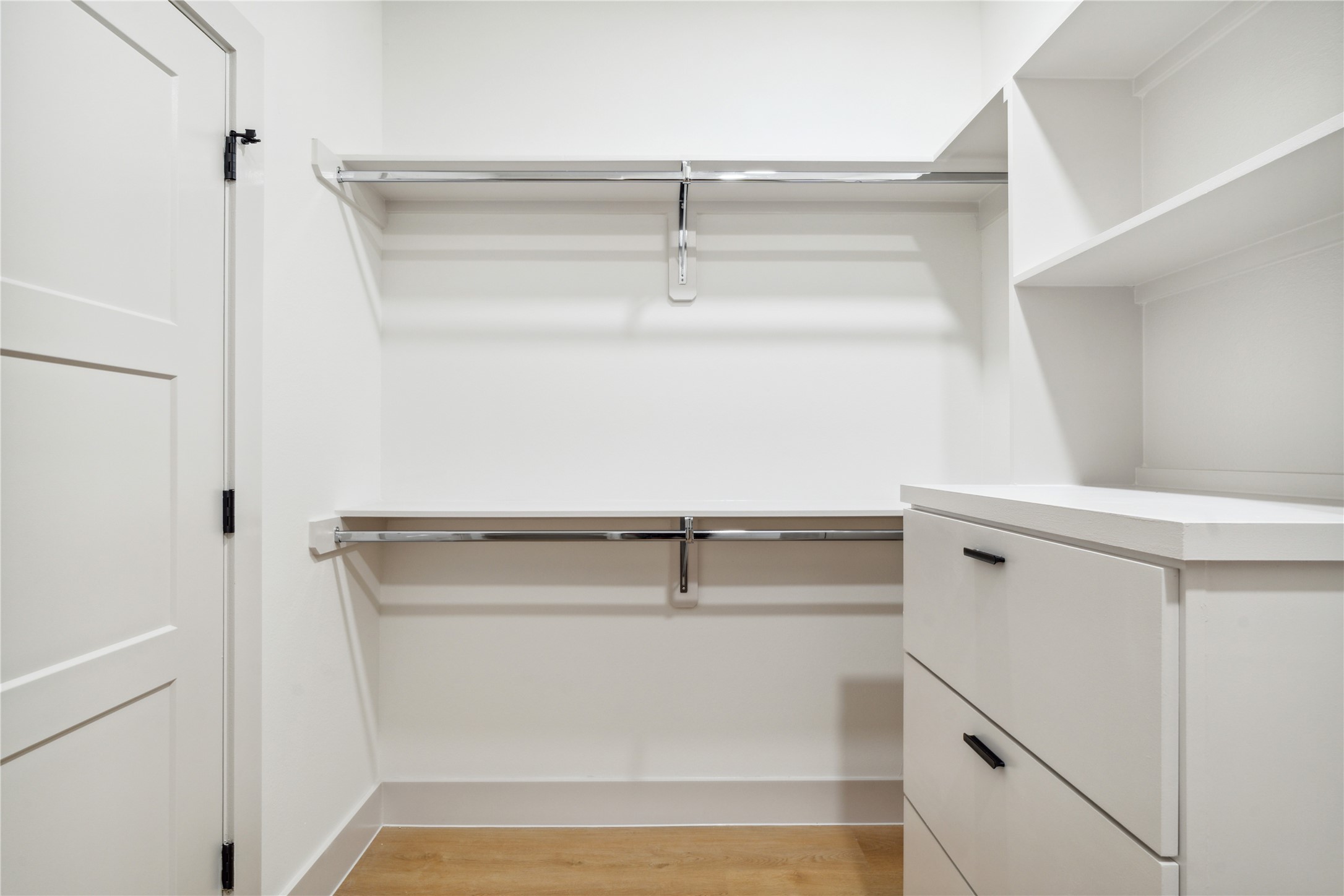 3415 Stonewall Street Houston, TX 77020 - Photo 39 of 50 Double hanging rods and deep drawers give every item its place—so your wardrobe works as hard as you do.