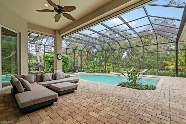 a view of a lobby with furniture and floor to ceiling windows