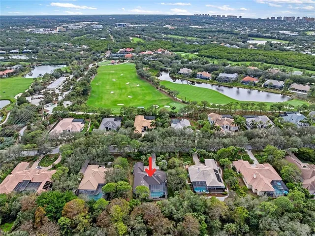 a view of swimming pool with outdoor seating