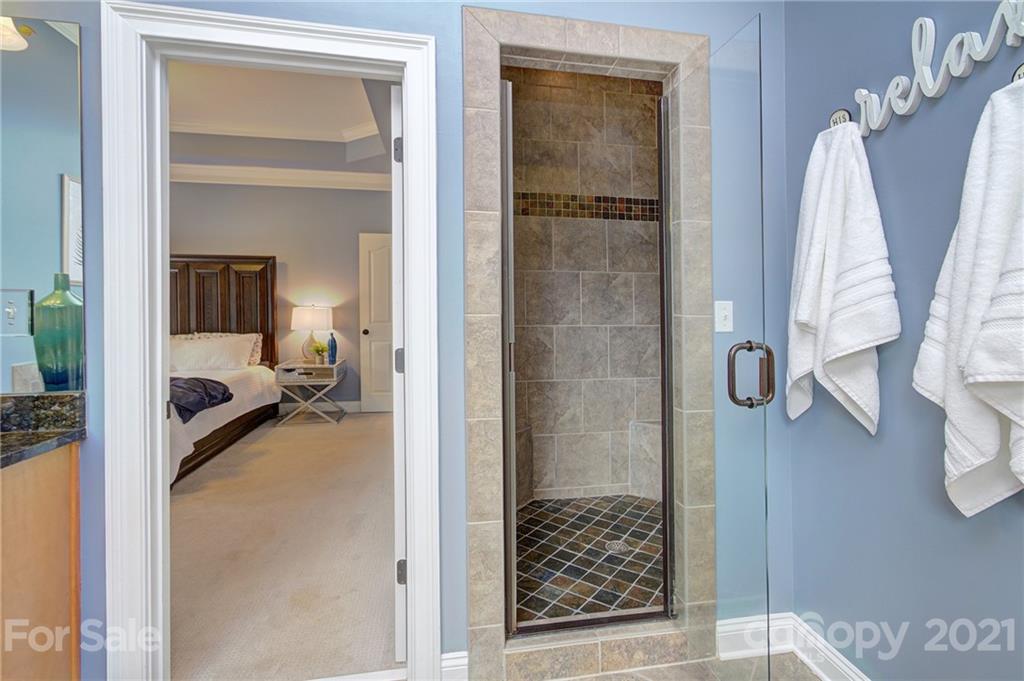 293 Point Carpenter Road Indian Land, SC 29707 - Photo 22 of 46 a en suite bathroom with a sink and a mirror