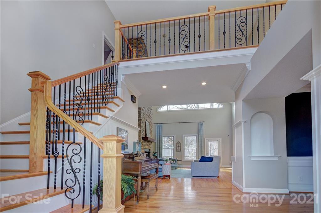 293 Point Carpenter Road Indian Land, SC 29707 - Photo 7 of 46 a view of entryway and hall with wooden floor