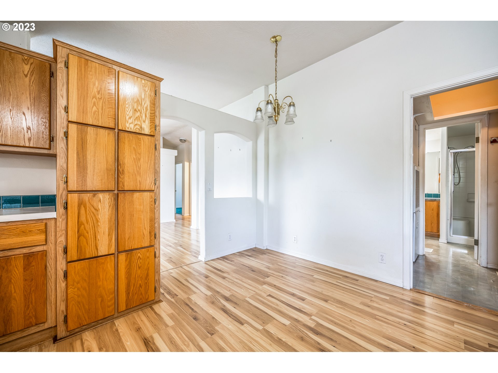 230 19th Street Springfield, OR 97477 - Photo 16 of 34 a view of an empty room with wooden floor