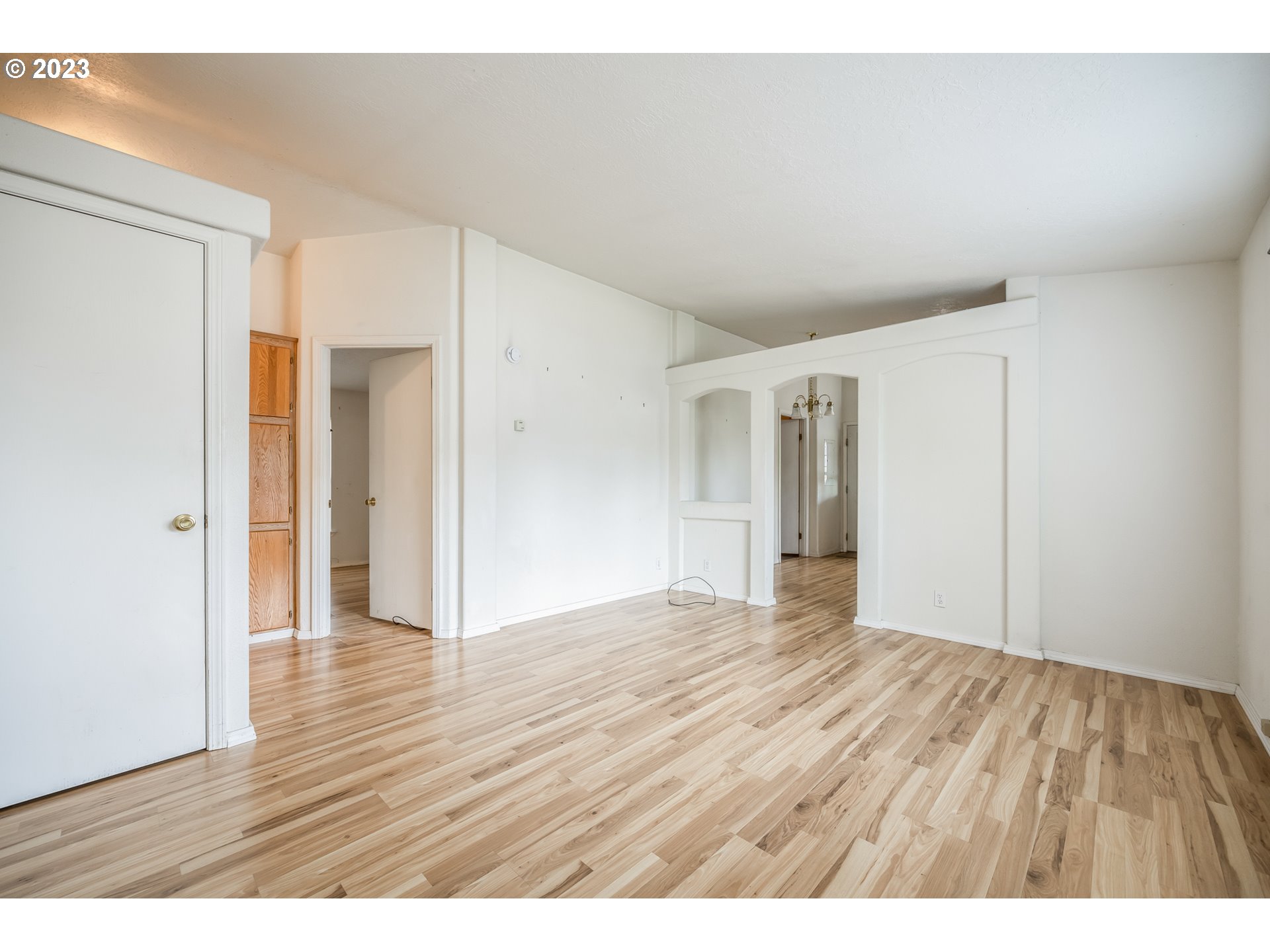 230 19th Street Springfield, OR 97477 - Photo 27 of 34 a view of an empty room and wooden floor