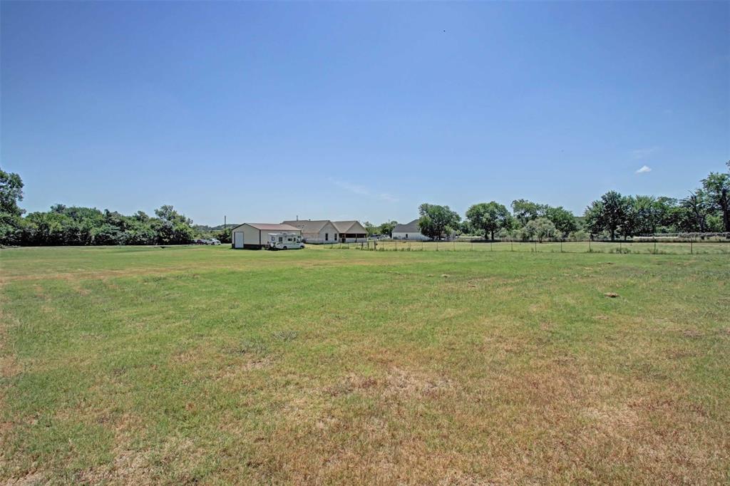 8789 Hutcheson Hill Road Springtown, TX 76082 - Photo 28 of 32 a view of a lake