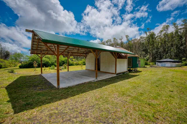 a view of a back yard of the house