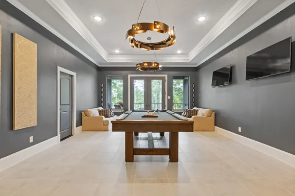 a view of a balcony and floor to ceiling windows