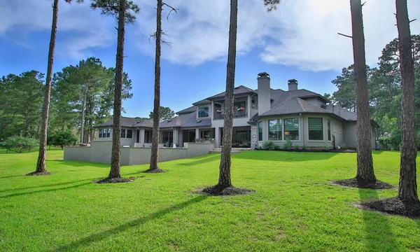 a view of a house with a big yard