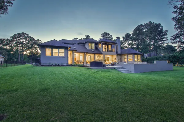a view of a park with large trees