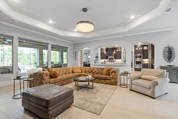 a large kitchen with a table and chairs