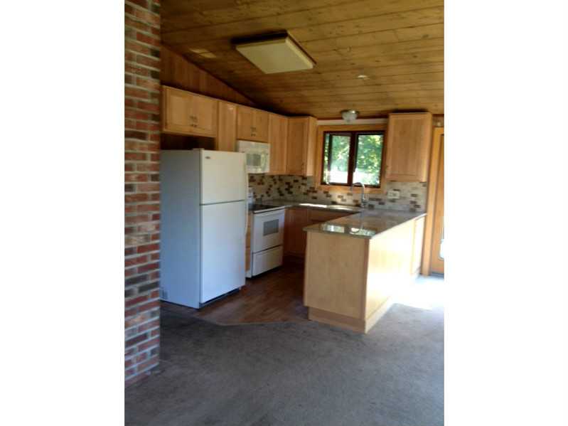 85 Sloop Street Jamestown, RI 02835 - Photo 2 of 6 Kitchen. New Kitchen with Refrigerator,Built In Microwave/Hood,Oven/Range, and Dishwasher