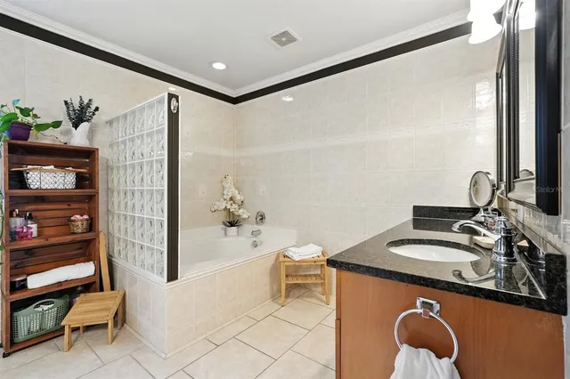 a bedroom with bed and a window