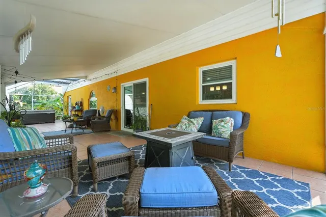 a view of a tree in front of a house