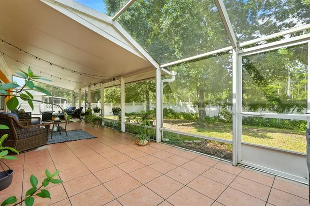 a aerial view of a house with a yard