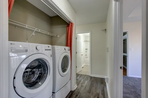 a utility room with dryer and washer