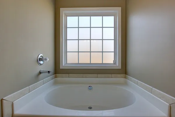 a bathroom with bathtub