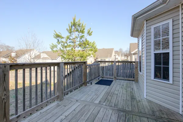 a view of a wooden roof deck