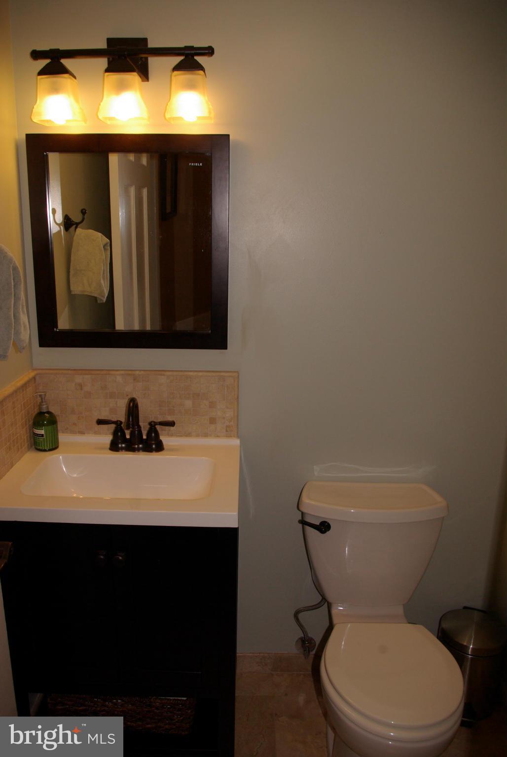 609 G Street Southwest Washington, DC 20024 - Photo 14 of 30 Convenient first floor powder room
