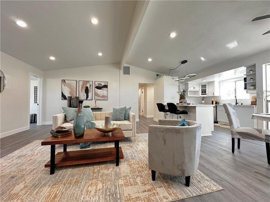 54838 El Prado Trail, Unit C7 Yucca Valley, CA 92284 - Photo 5 of 18 a living room with furniture and a table