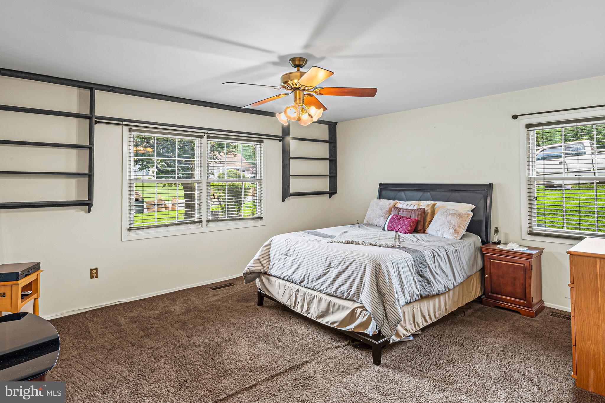 12128 Long Ridge Lane Bowie, MD 20715 - Photo 16 of 39 a bedroom with a bed and window