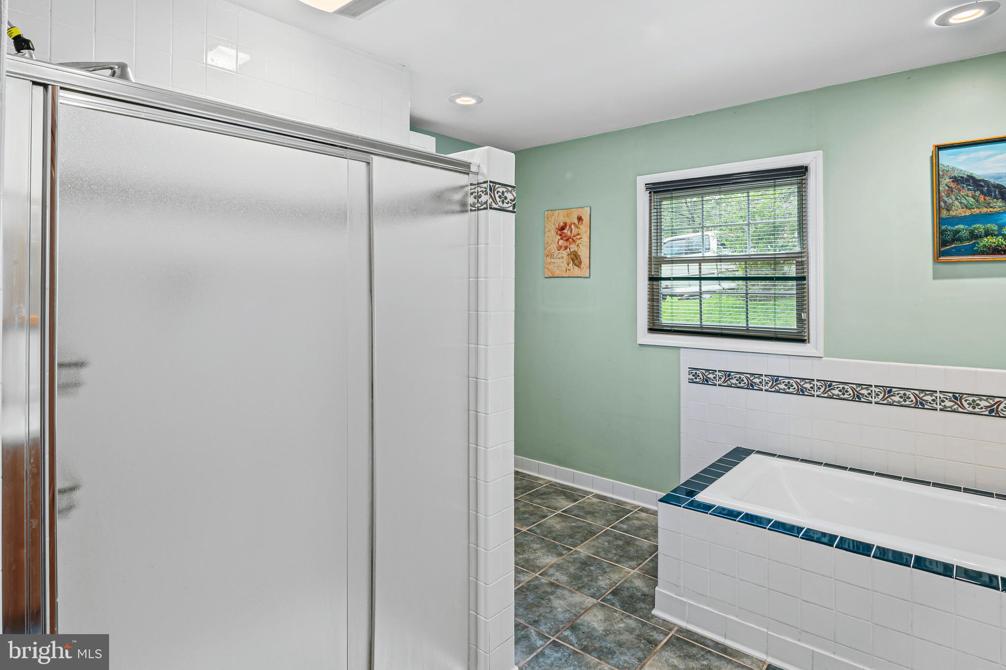 12128 Long Ridge Lane Bowie, MD 20715 - Photo 21 of 39 a bathroom with a granite countertop sink and a mirror
