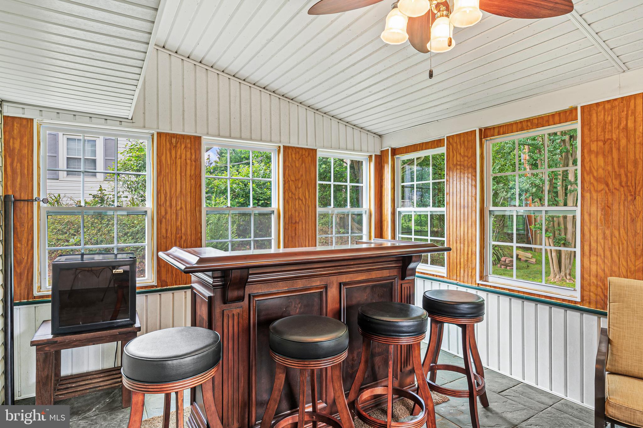 12128 Long Ridge Lane Bowie, MD 20715 - Photo 23 of 39 a kitchen with a table and chairs
