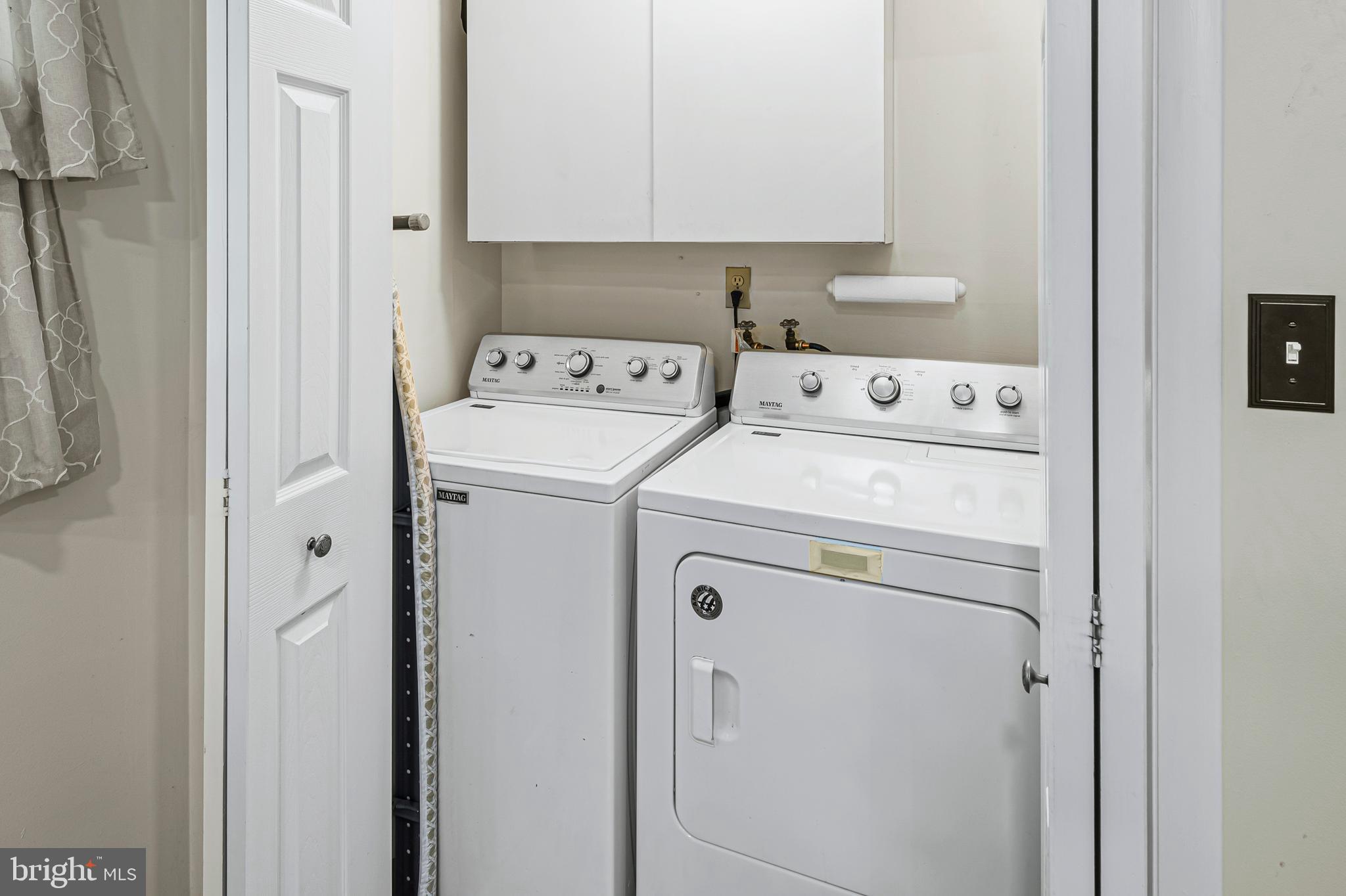 12128 Long Ridge Lane Bowie, MD 20715 - Photo 25 of 39 a utility room with dryer and washer