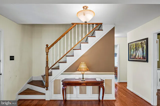 a view of entryway with wooden floor