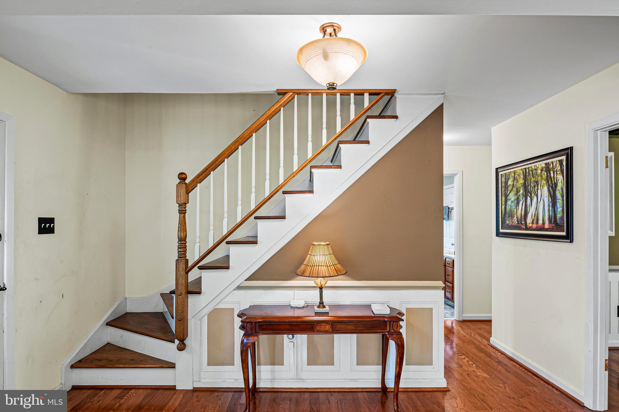 12128 Long Ridge Lane Bowie, MD 20715 - Photo 26 of 39 a view of entryway with wooden floor