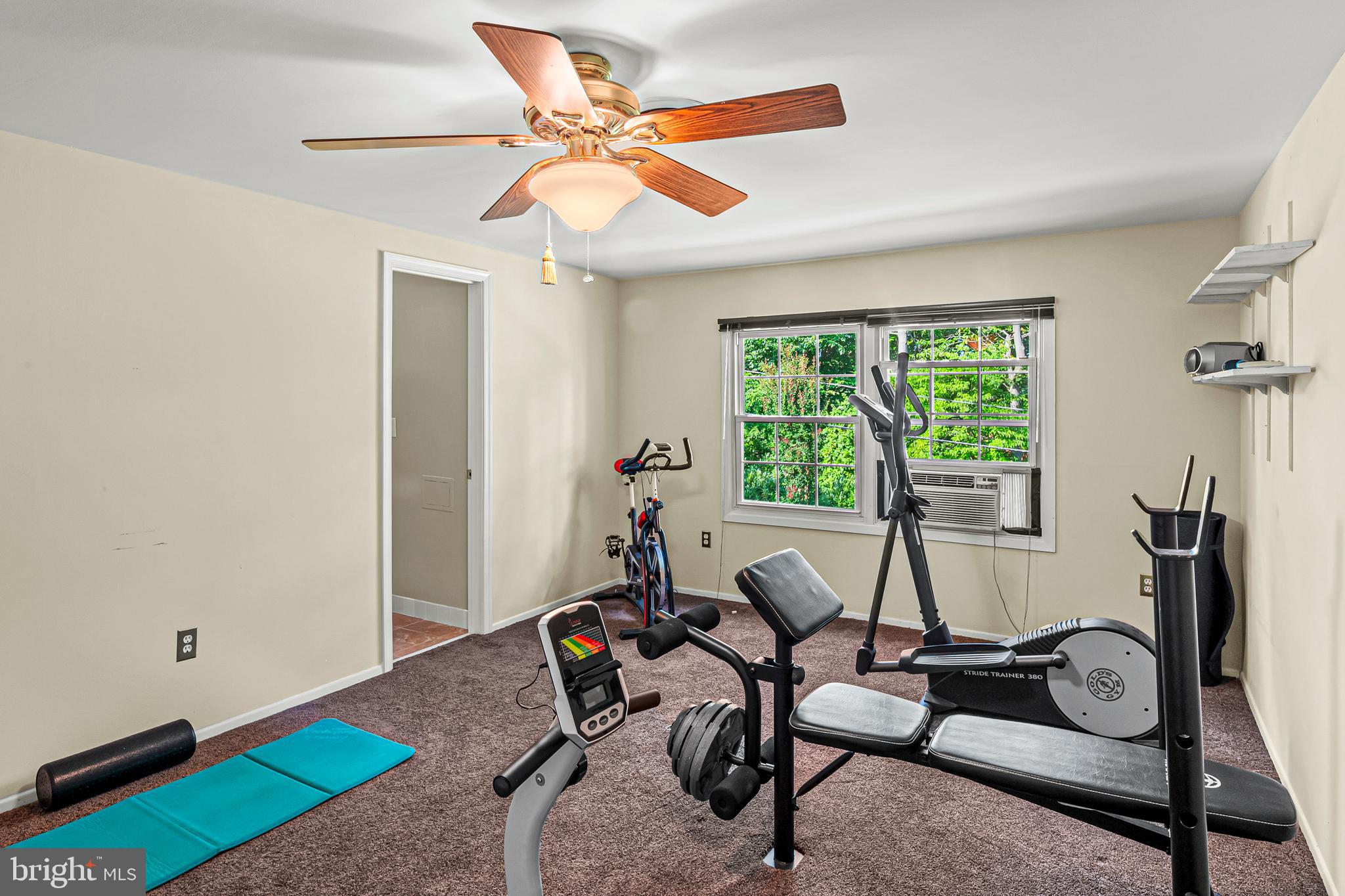 12128 Long Ridge Lane Bowie, MD 20715 - Photo 33 of 39 a living room with furniture and a window