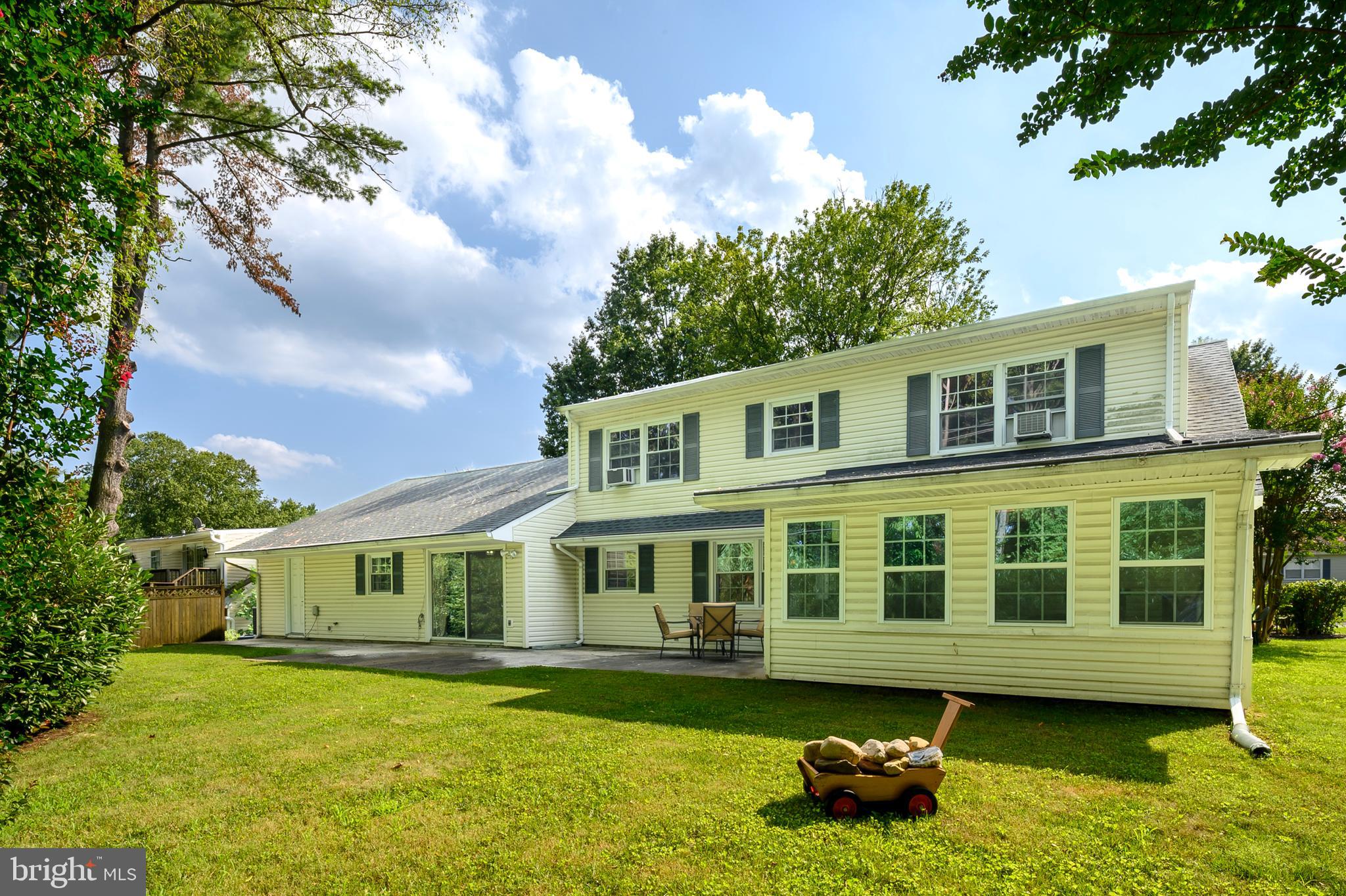 12128 Long Ridge Lane Bowie, MD 20715 - Photo 39 of 39 a front view of a house with garden