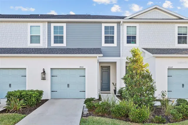a view of a back yard of the house