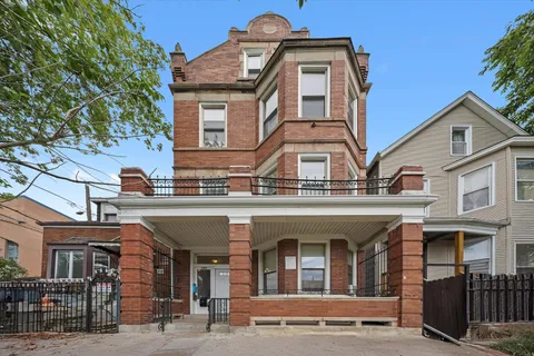 a view of building with a balcony