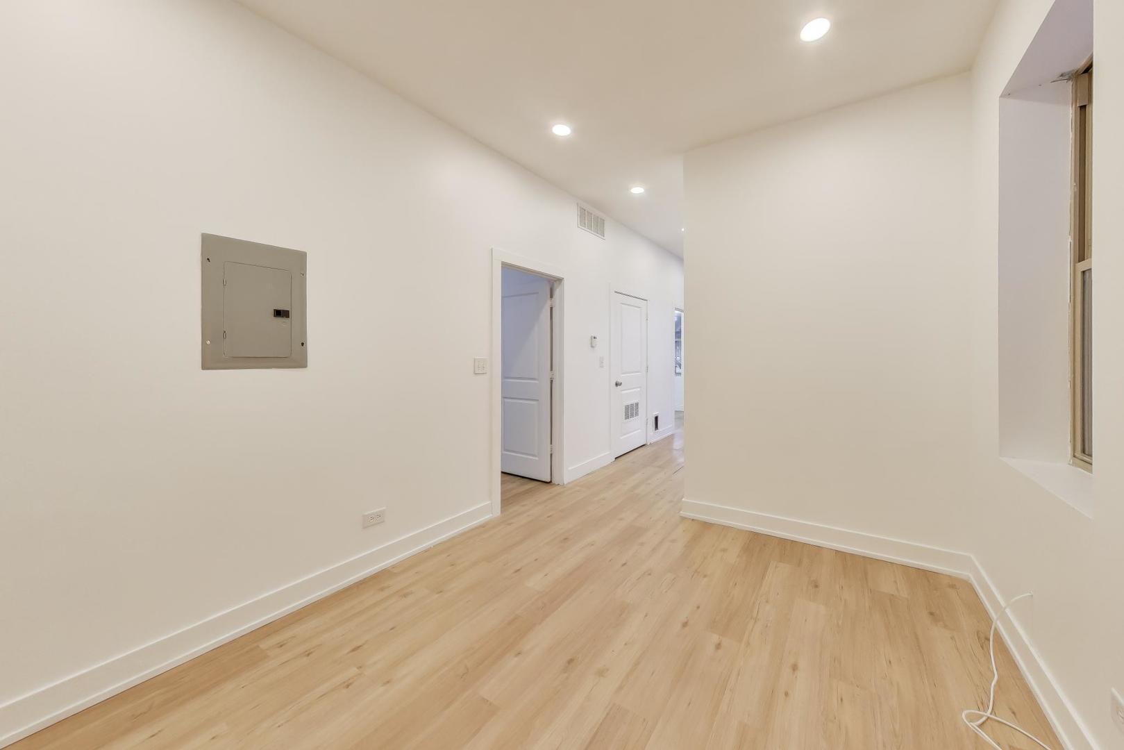 1908 West 48th Street, Unit 1R Chicago, IL 60609 - Photo 5 of 17 a view of an empty room