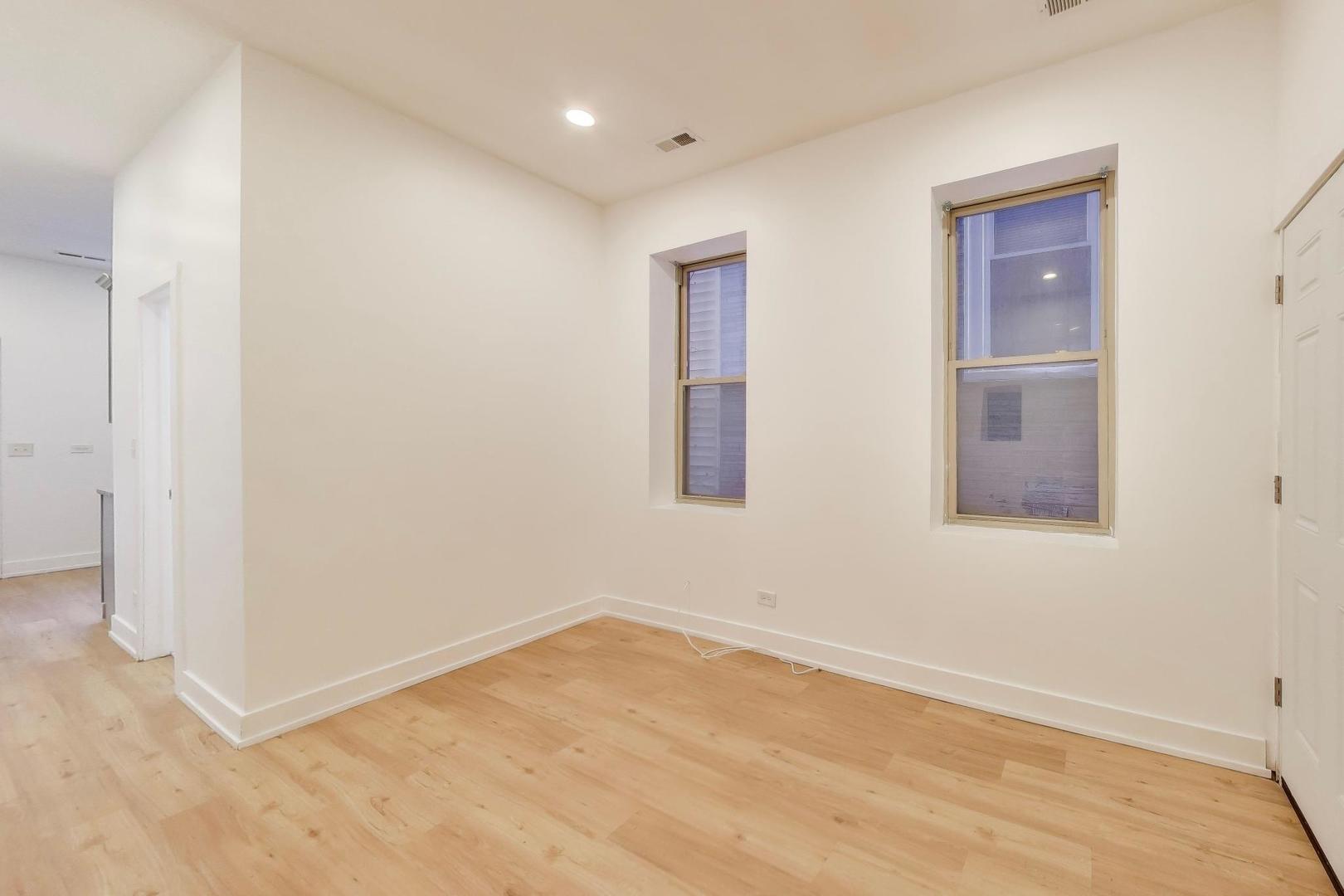 1908 West 48th Street, Unit 1R Chicago, IL 60609 - Photo 6 of 17 a view of an empty room