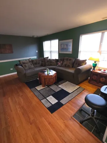 a indoor room with furniture and a window