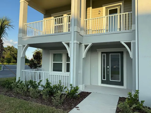 a front view of a house with a porch