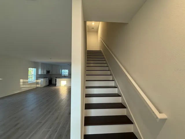 a view of storage and utility room with washer and dryer
