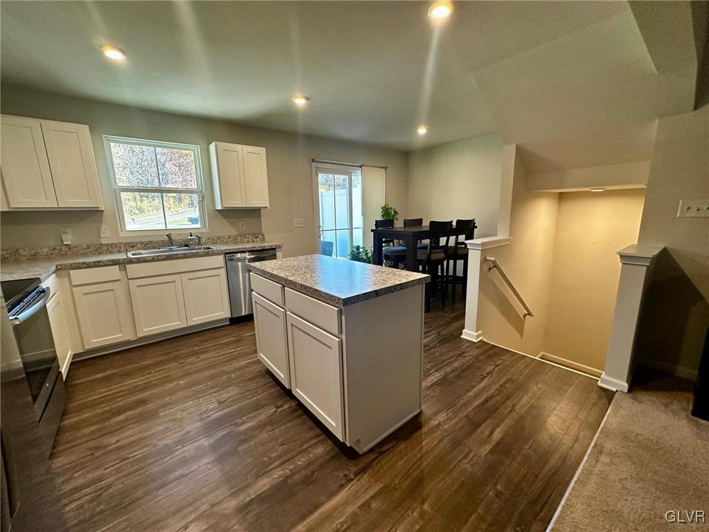 551 Delta Road Northampton, PA 18067 - Photo 10 of 43 a large kitchen with sink a refrigerator and a stove top oven