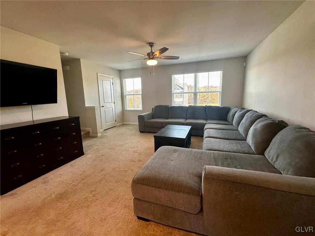 551 Delta Road Northampton, PA 18067 - Photo 16 of 43 a living room with furniture and a flat screen tv