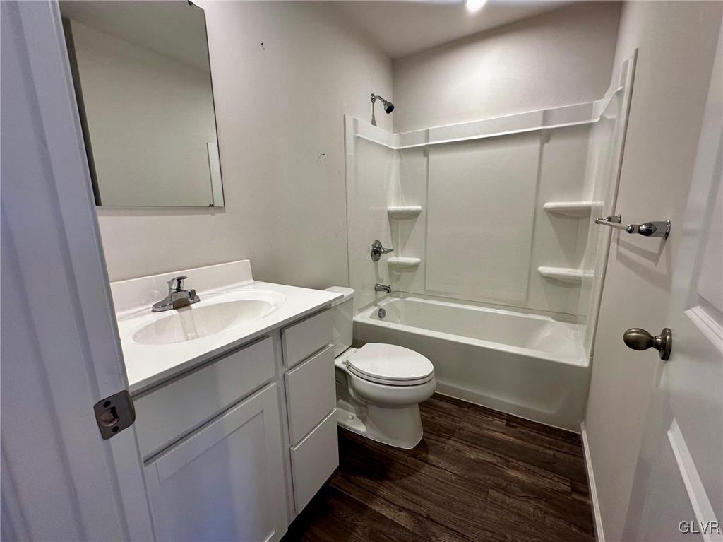 551 Delta Road Northampton, PA 18067 - Photo 25 of 43 a bathroom with a sink toilet a mirror and shower