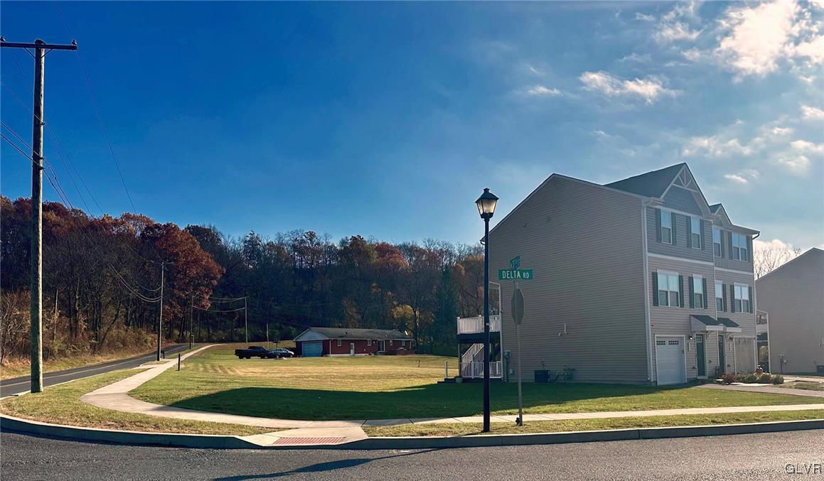 551 Delta Road Northampton, PA 18067 - Photo 3 of 43 a view of swimming pool in front of residential houses